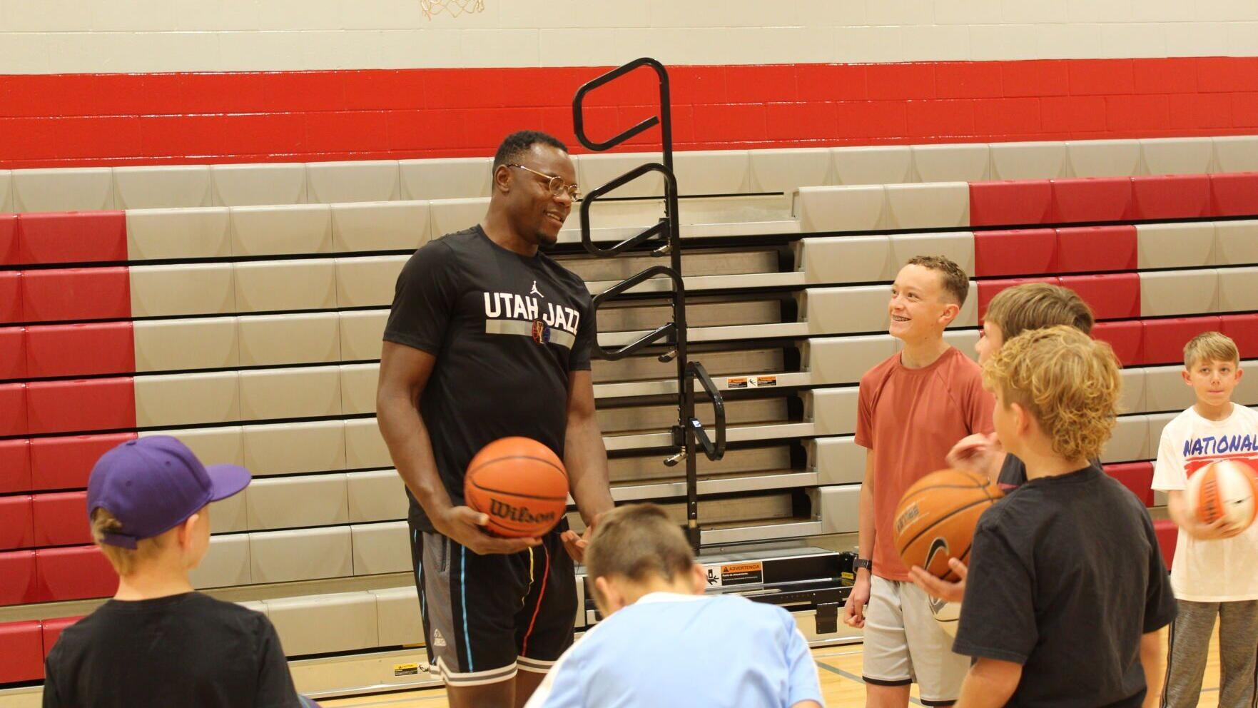 Utah Jazz player Oscar Tshiebwe entertains at special meet-and-greet at Irving Middle School